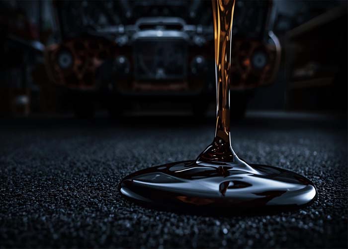 Mechanic checking car engine during regular service-Maintenance Guide for Petrol and Diesel Cars