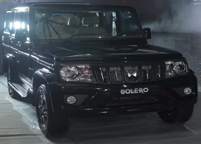Mahindra Bolero B8 front view showcasing bold grille and fog lamps