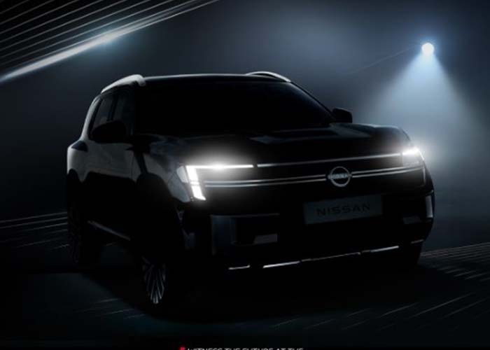 Rear view of Nissan Tekton C-SUV with connected LED tail lights and sporty spoiler