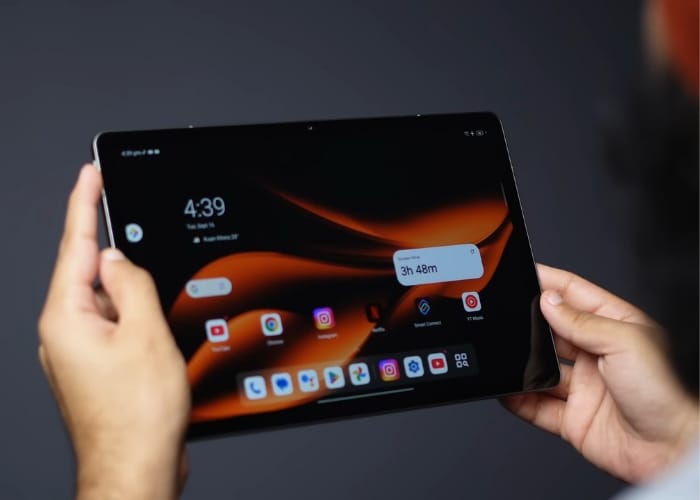 Top view of Moto Pad 60 Neo showing Dolby Atmos quad speakers and USB-C port